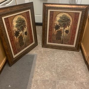 A set of wall pictures of palm trees